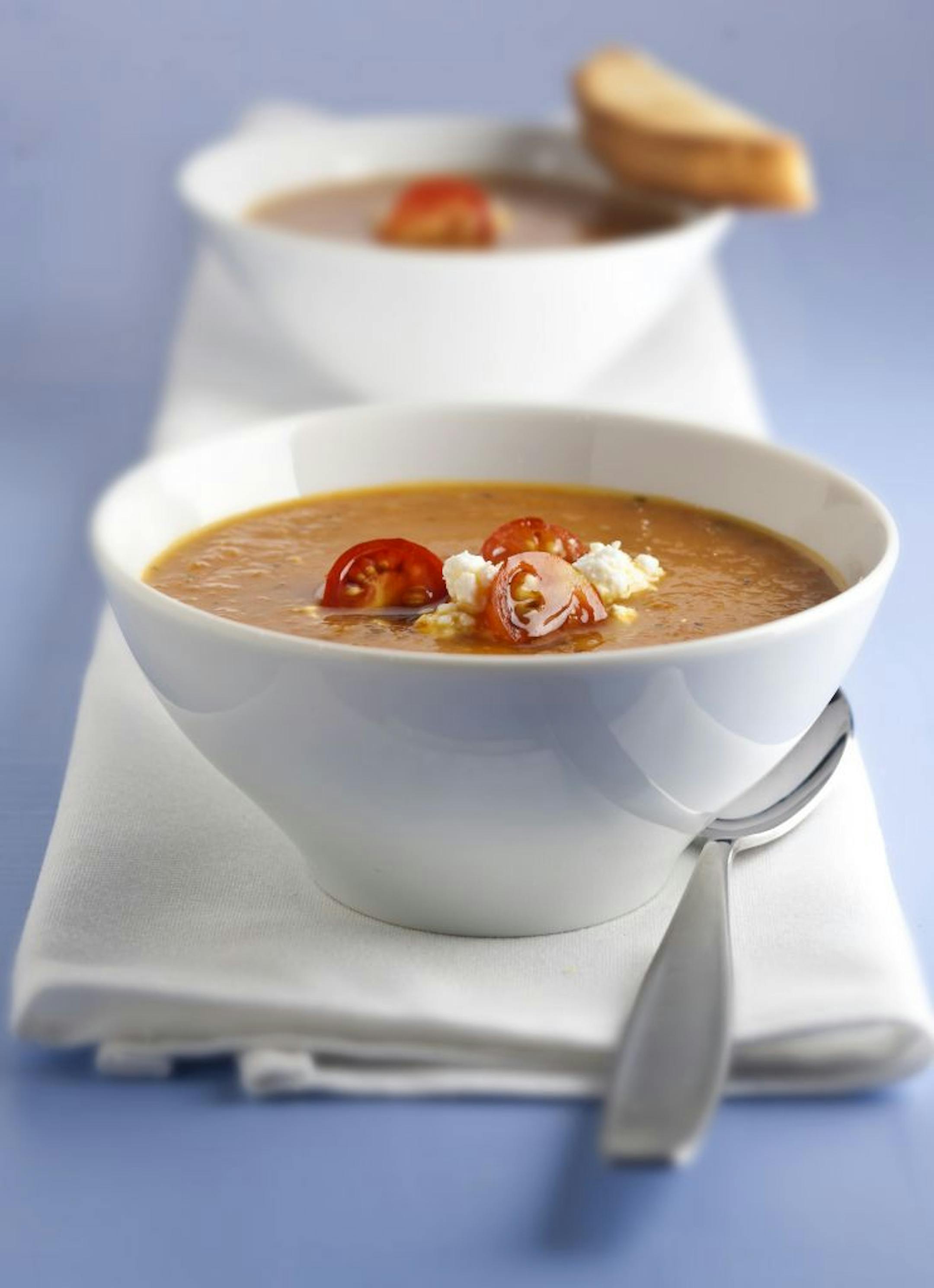 Slow roast heirlooms before turning them into a richly flavored tomato soup.