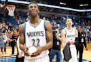 Minnesota Timberwolves Andrew Wiggins (22) and Zach LaVine (8) tossed shirts into the stands after the final game of the season.