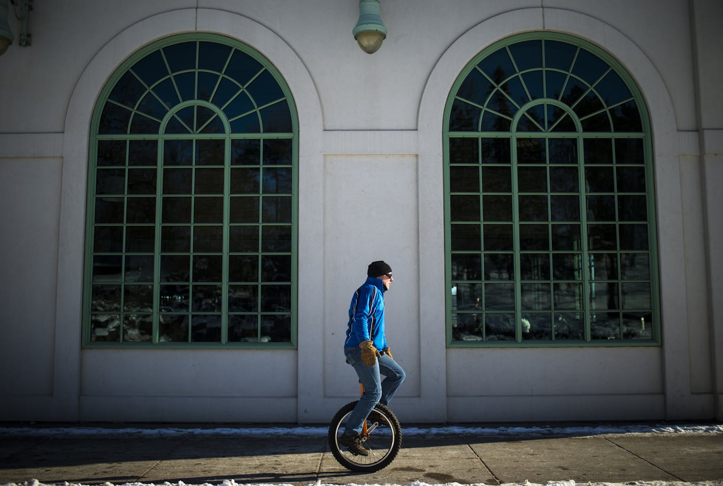 Mike Schatz, with the Twin Cities Unicyclists Club, rode his unicycle around Como Dockside during the annual "Tundracon" gathering on New Years Day. ] (AARON LAVINSKY/STAR TRIBUNE) aaron.lavinsky@startribune.com Minneapolis is home to some of the best unicyclists in the world. Who knew? Meet the zany members of the Twin Cities Unicyclists Club who practice year-round - playing unicycle hockey and basketball, juggling, unicycle racing and more. We photograph the club at their annual "Tundracon" g