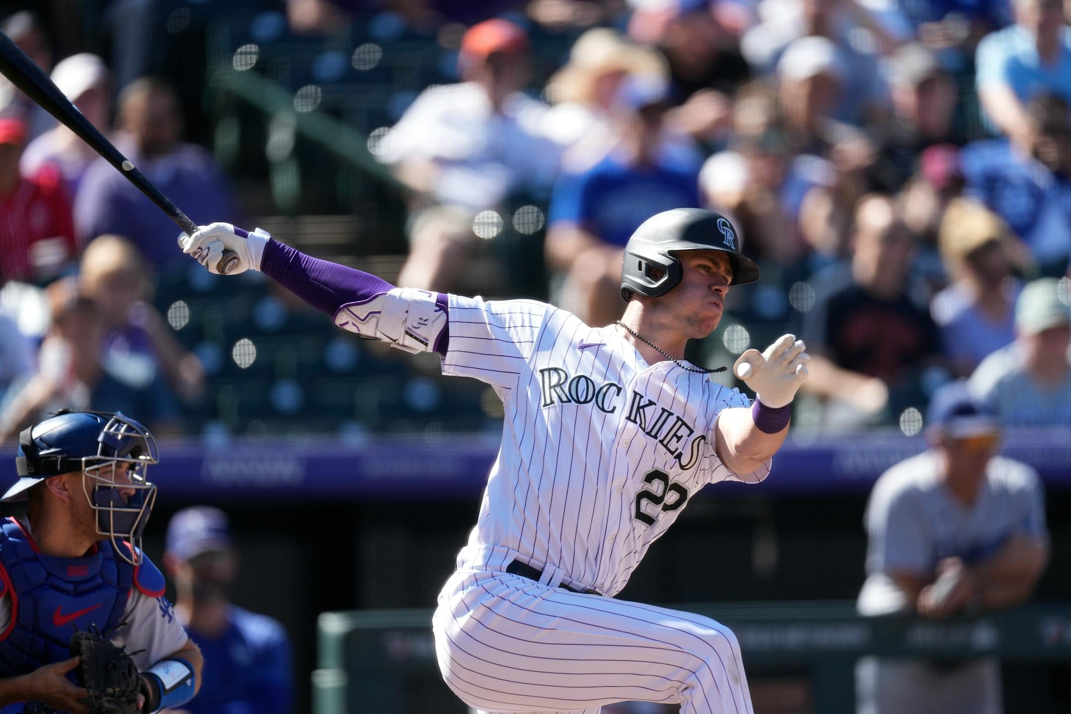 Colorado Rockies right fielder Nolan Jones (22) in the second inning of the first game of a baseball doubleheader on Tuesday, Sept. 26, 2023, in Denver. (AP Photo/David Zalubowski)