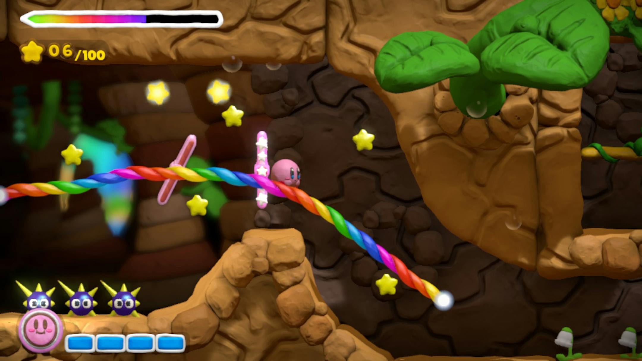 This photo provided by Nintendo of America shows a scene from the video game "Kirby and the Rainbow Curse," (Nintendo, for Wii U, $39.99), in which the title character explores an underground level. (AP Photo/Nintendo of America)