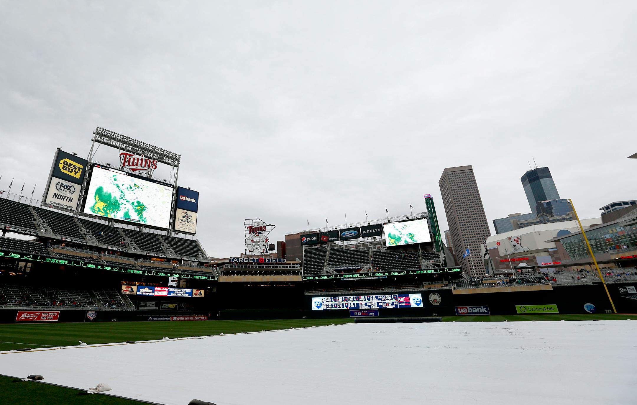 The screens at Target Field displayed the radar weather report. Monday night's game between the Minnesota Twins and Baltimore Orioles was postponed because of inclement weather.