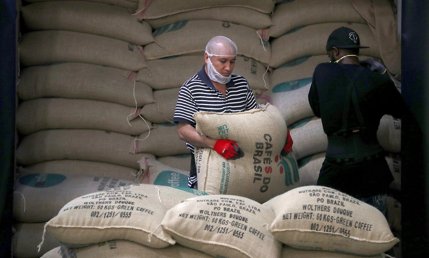 Cameron's employees unloaded bags of beans at the plant, Wednesday, September 14, 2016 in Shakopee, MN. In 2009, Cameron's Coffee designed a brand new state-of-the-art coffee processing and packaging facility in Shakopee. The in-home coffee brand has increased sales 350% since 2009. ] (ELIZABETH FLORES/STAR TRIBUNE) ELIZABETH FLORES &#x2022; eflores@startribune.com