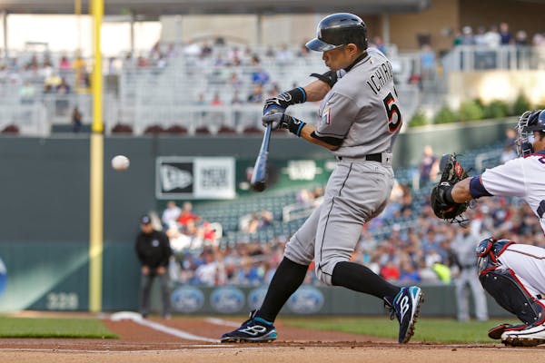 Miami Marlins' Ichiro Suzuki hits a single against the Minnesota Twins during the first inning of a baseball game Tuesday, June 7, 2016, in Minneapoli