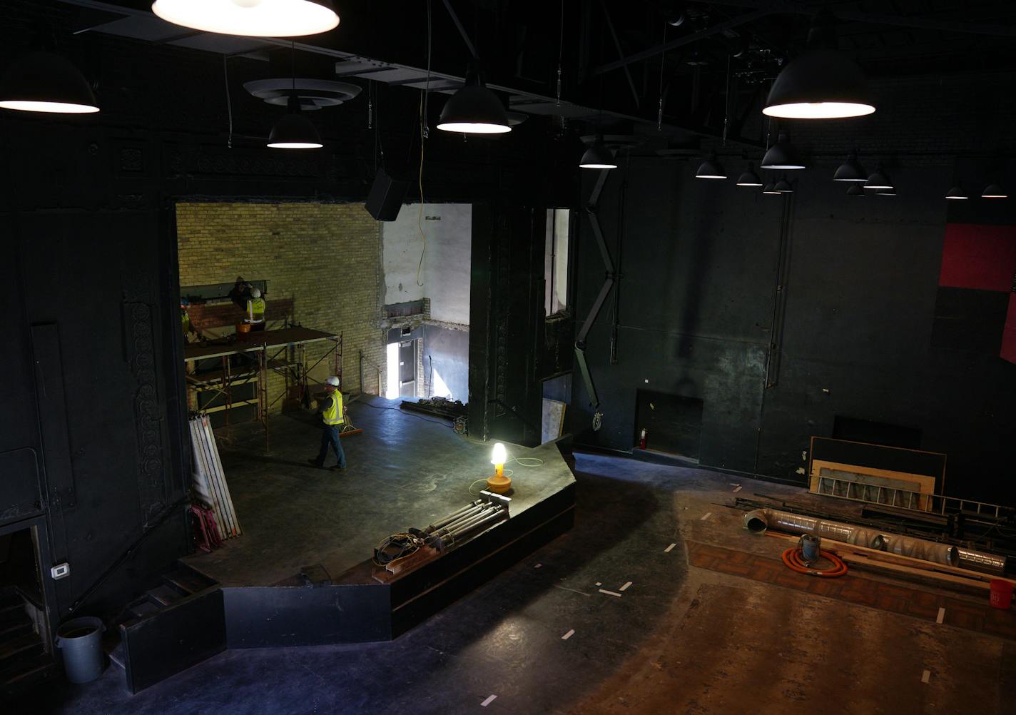 Workers filled in a section of the Capri Theater's rear wall. The 250-seat main auditorium is being renovated.