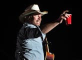 Toby Keith toasts his fans with a red Solo Cup, the name of one of his hit songs, on April 26, 2013 during the first day of the Stagecoach Country Mus