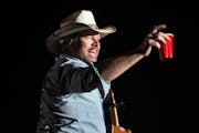 Toby Keith toasts his fans with a red Solo Cup, the name of one of his hit songs, on April 26, 2013 during the first day of the Stagecoach Country Mus