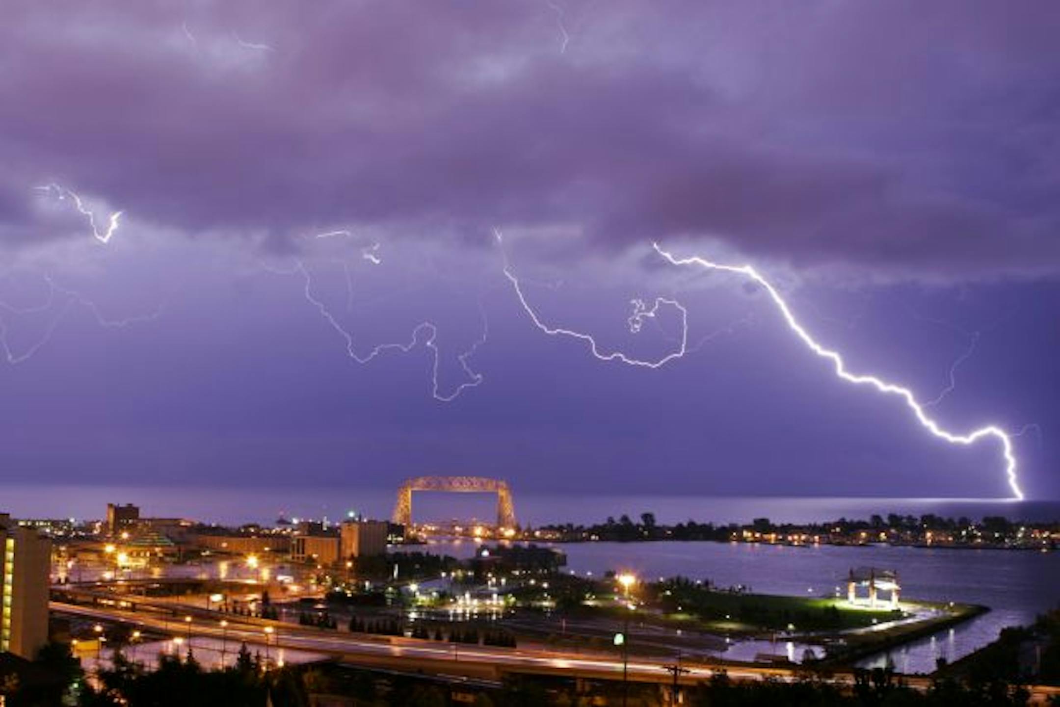 Lightning above Canal Park and Bayfront Park from the book "Picture Duluth," by Dennis O'Hara
