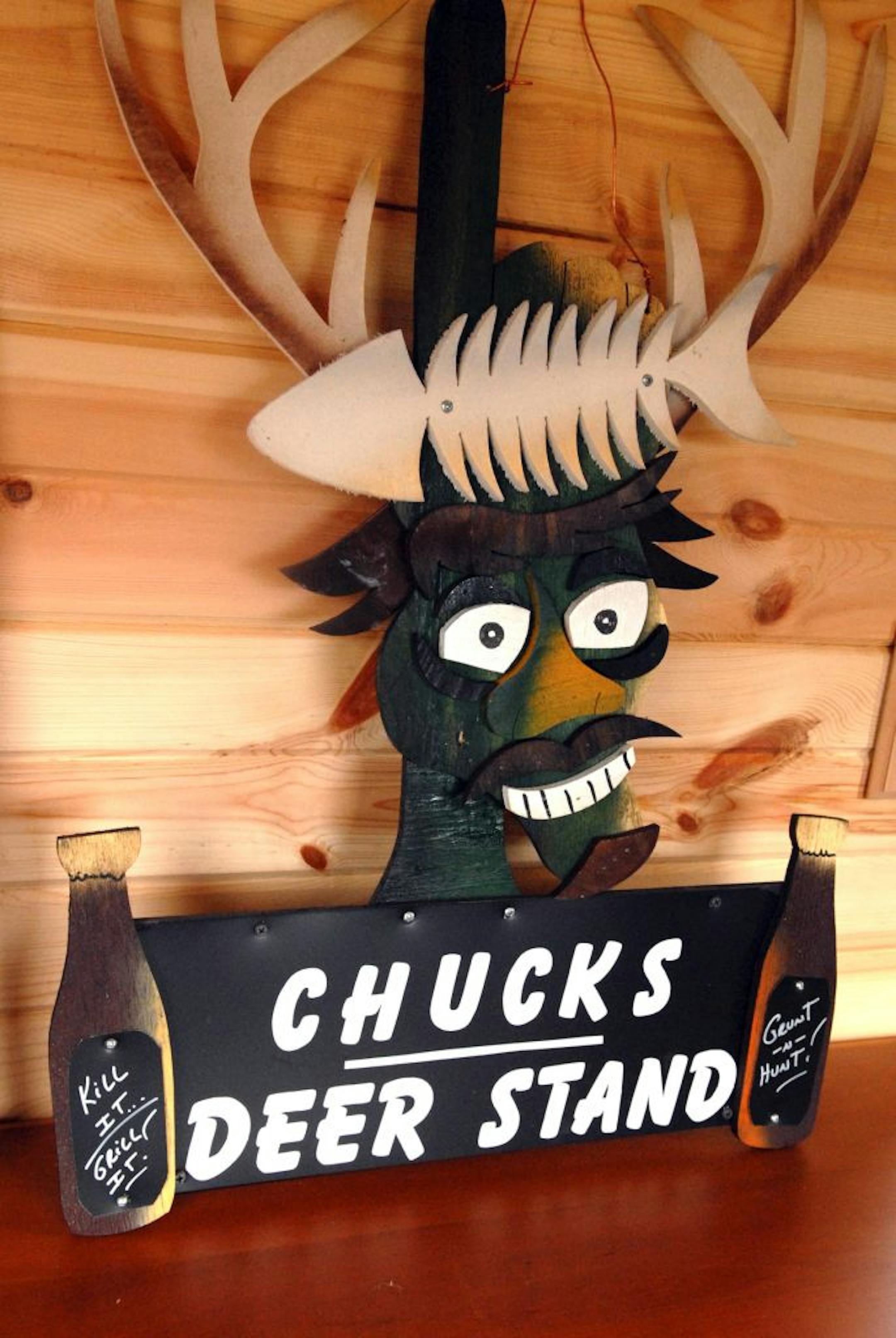 A sign in the three story deer stand built by Dave and Chuck Kannegaard announces its primary ownership.