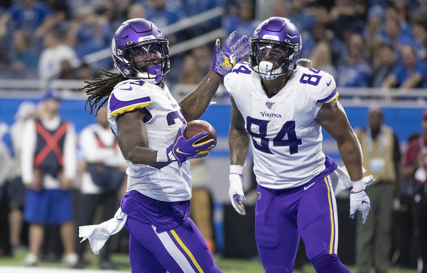 Minnesota Vikings running back Dalvin Cook (33) celebrated his fourth quarter touchdown run at Ford Field.with Irv Smith. Jr.