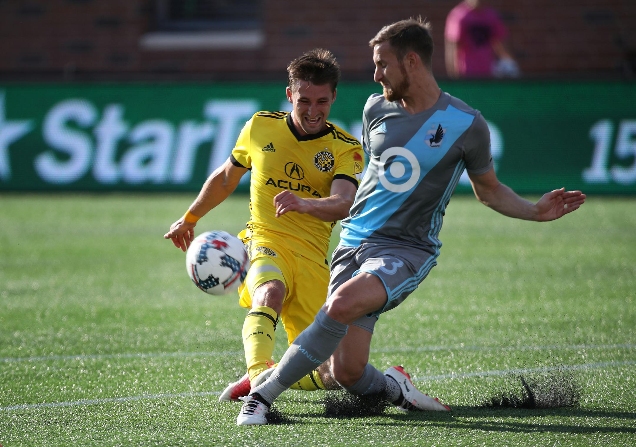 Columbus Crew SC midfielder Ethan Finlay (13) left was blocked by Minnesota United defender Jerome Thiesson (3) in the first half Tuesday at TCF Bank Stadium July 4, 2017 in Minneapolis, MN. ] Minnesota United hosted the Columbus at TCF Bank Stadium JERRY HOLT � jerry.holt@startribune.com
