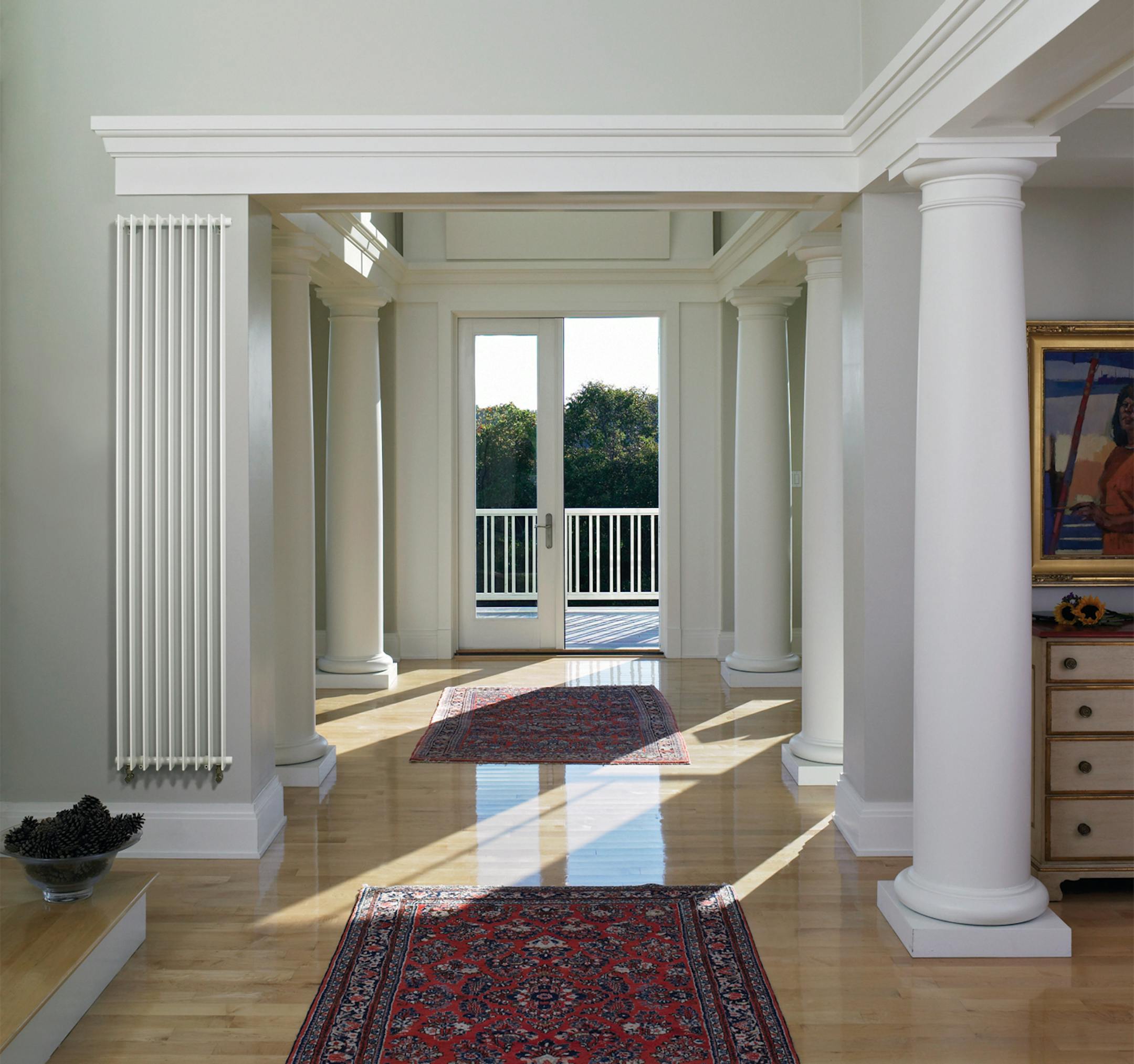 Modern radiators such as this one from Runtal, are slimmer and more efficient than their traditional predecessors. They range from sleek, nearly architectural-looking designs like this one to small baseboard installations. credit: Runtal