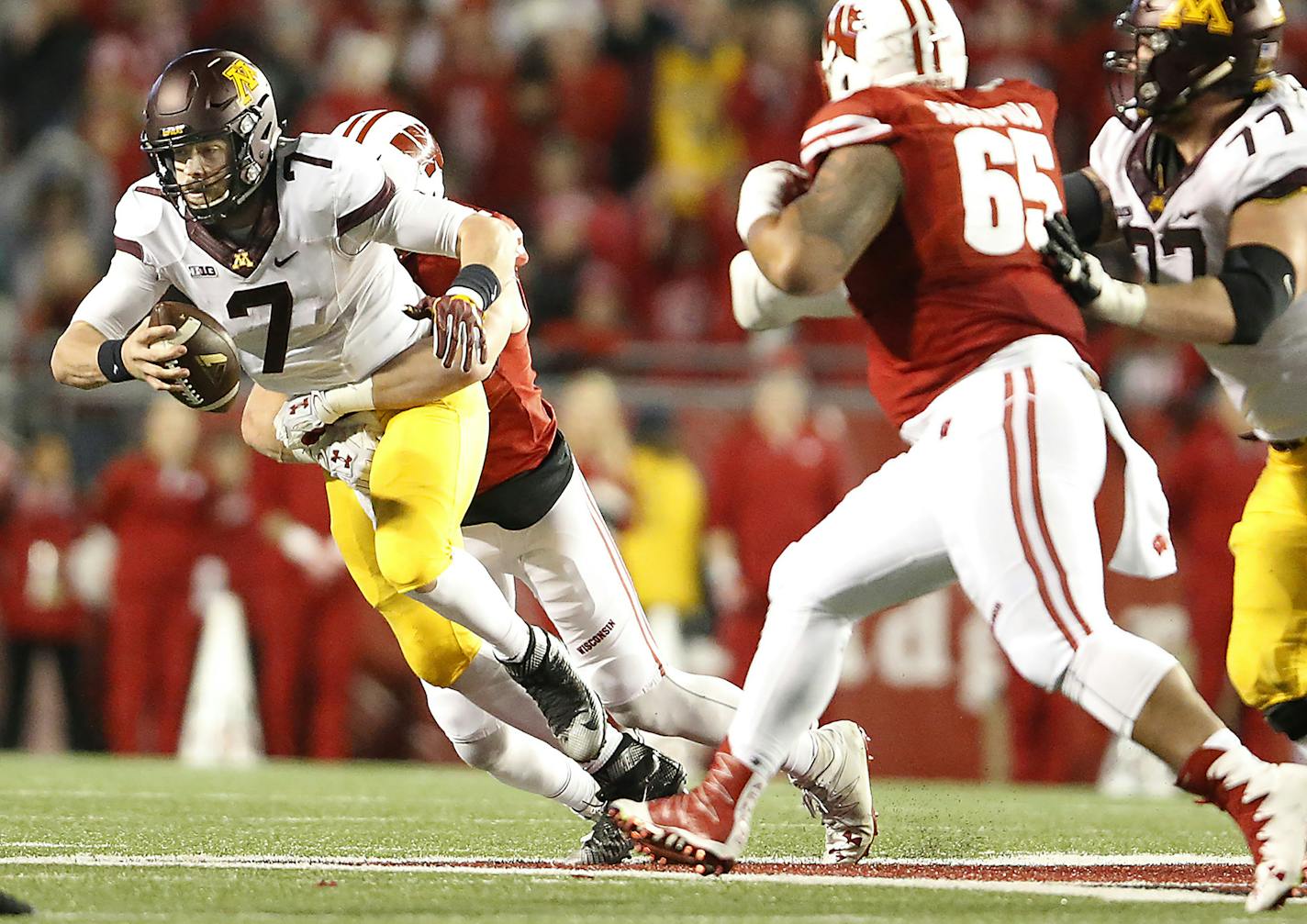 Minnesota's quarterback Mitch Leidner was sacked by Wisconsin's T.J. Watt in the fourth quarter as Minnesota took on Wisconsin at Camp Randall Stadium, Saturday, November 26, 2016 in Madison, Wis. ] (ELIZABETH FLORES/STAR TRIBUNE) ELIZABETH FLORES &#xef; eflores@startribune.com