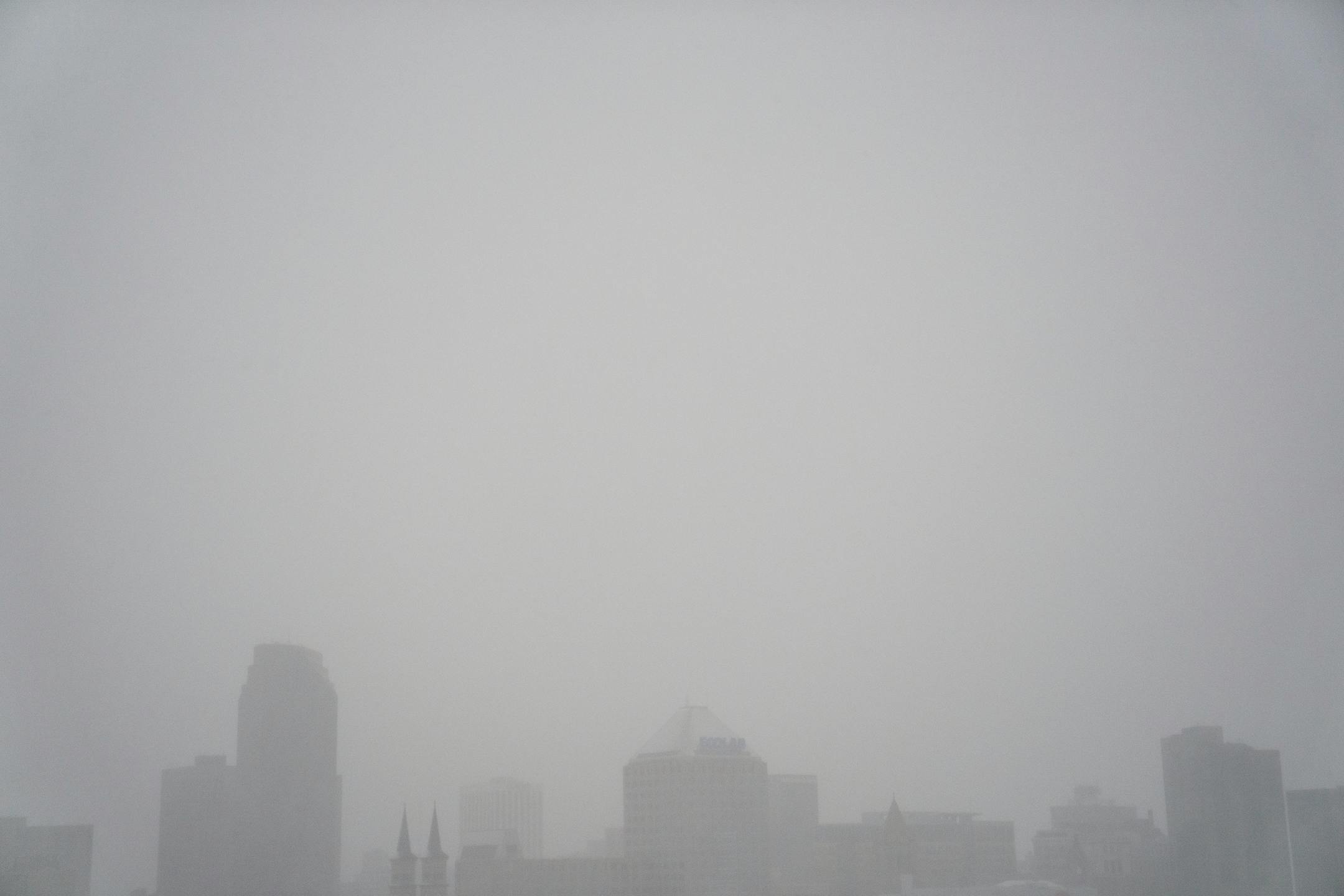 Downtown St. Paul is obscured by snow during a major winter storm in St. Paul.