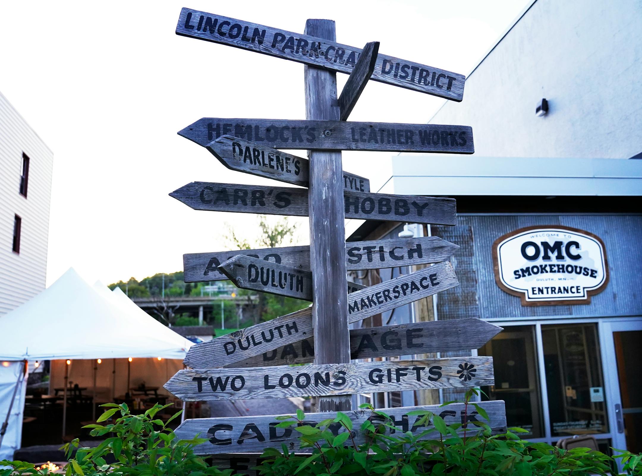 Signs outside OMC Smokehouse, along W. Superior St. Monday, June 6, 2022 in Duluth, Minn.