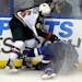 Wild defenseman Jared Spurgeon (46) sent Blues center Philip McRae into the boards, drawing a boarding penalty, in the third period of Thursday's pres
