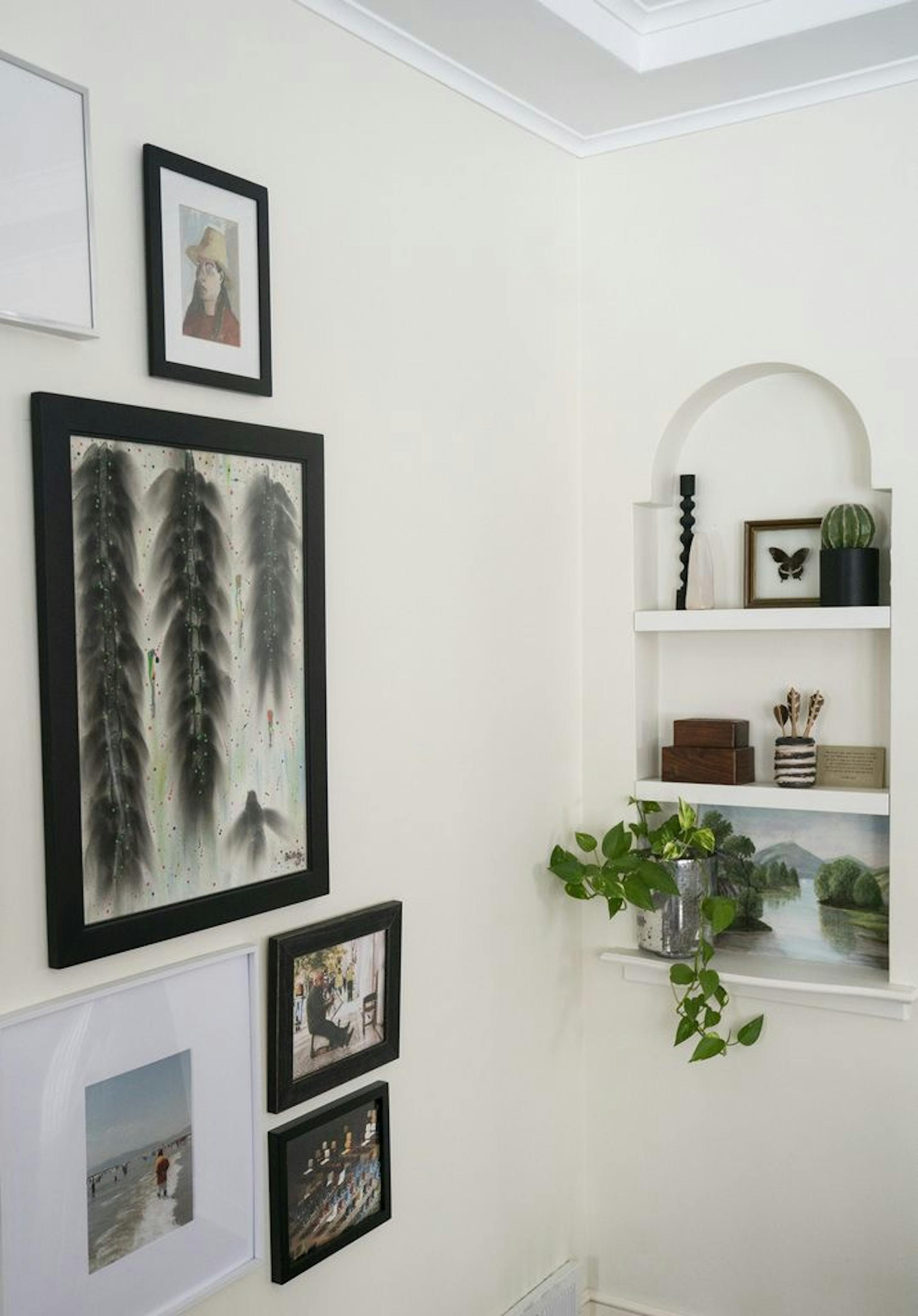 A built-in nook next to the photo wall.