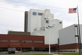 FILE - An Abbott Laboratories manufacturing plant is shown in Sturgis, Mich., on Sept. 23, 2010. Severe weather has forced Abbott Nutrition to pause p