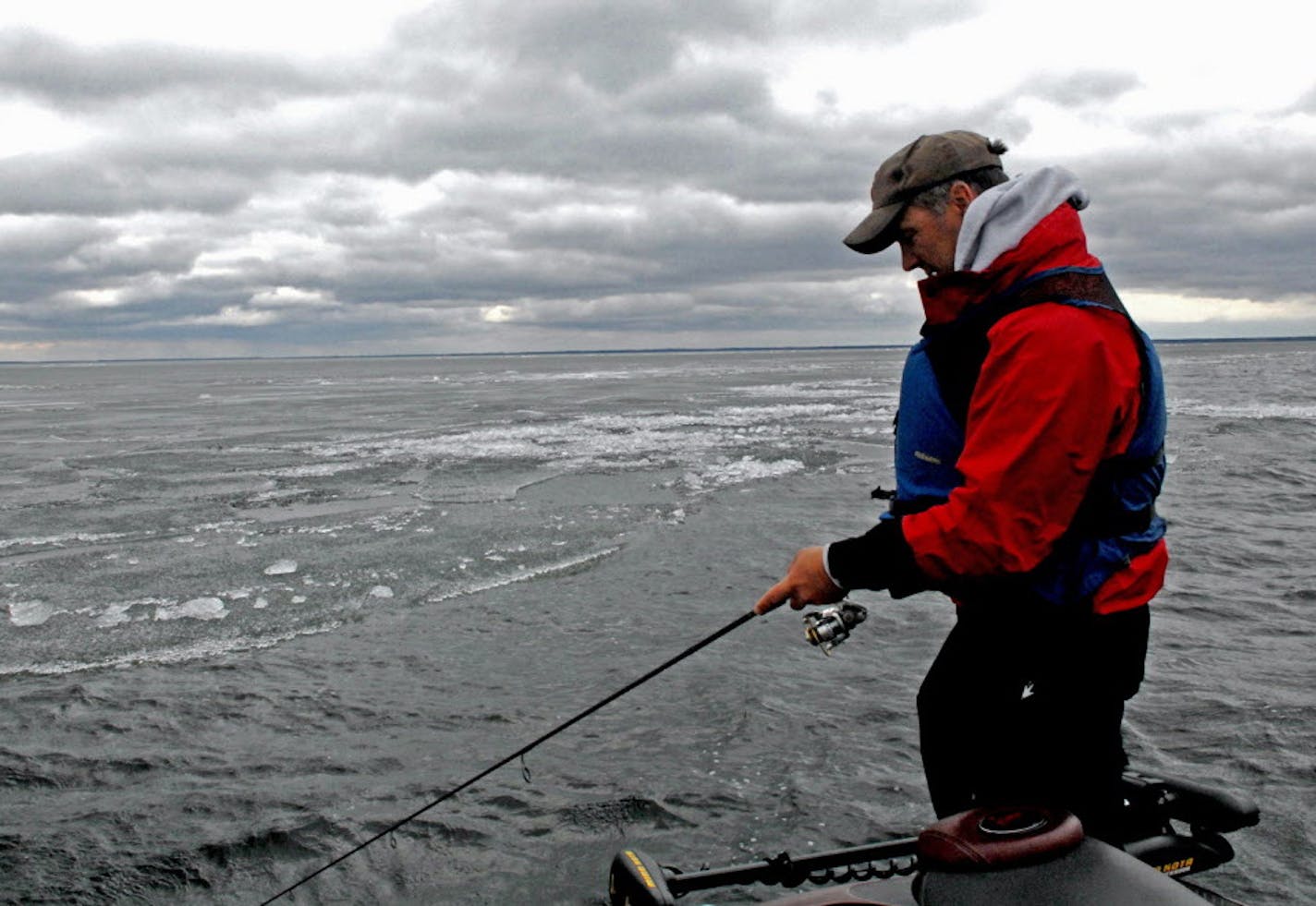 John Heroff of Stillwater tried his luck for walleyes, following the edge of a massive sheet of ice that still covered most of Lake Winnibigoshish on opening day last May.