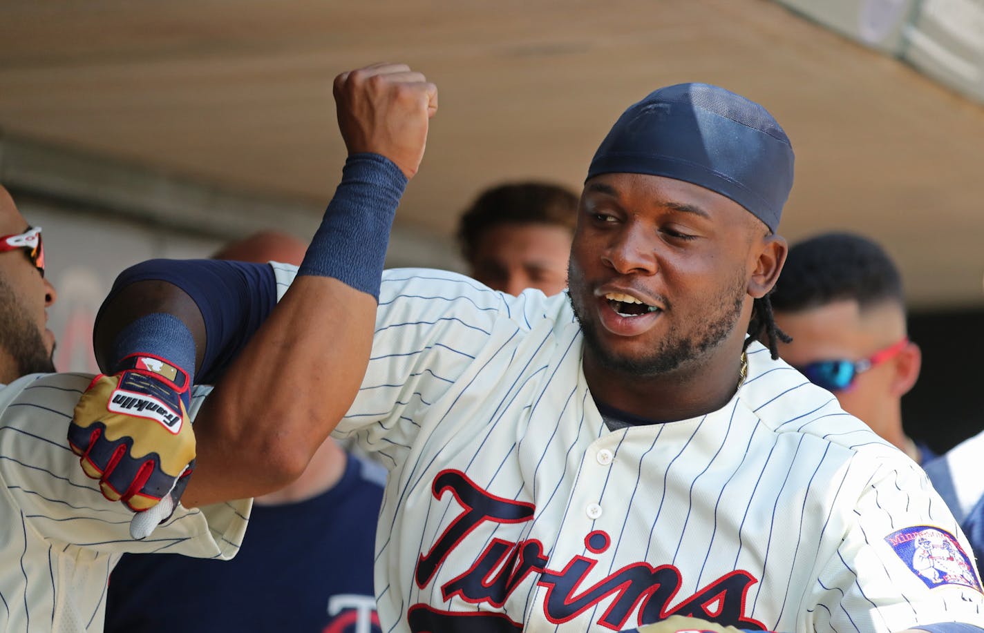 Miguel Sano was greeted by teammates in the dugout after homering in the third inning. ] Shari L. Gross &#xef; sgross@startribune.com The Minnesota Twins lost 5-1 to the Baltimore Orioles in an afternoon matinee at Target Field in Minneapolis on Saturday, July 8, 2017.