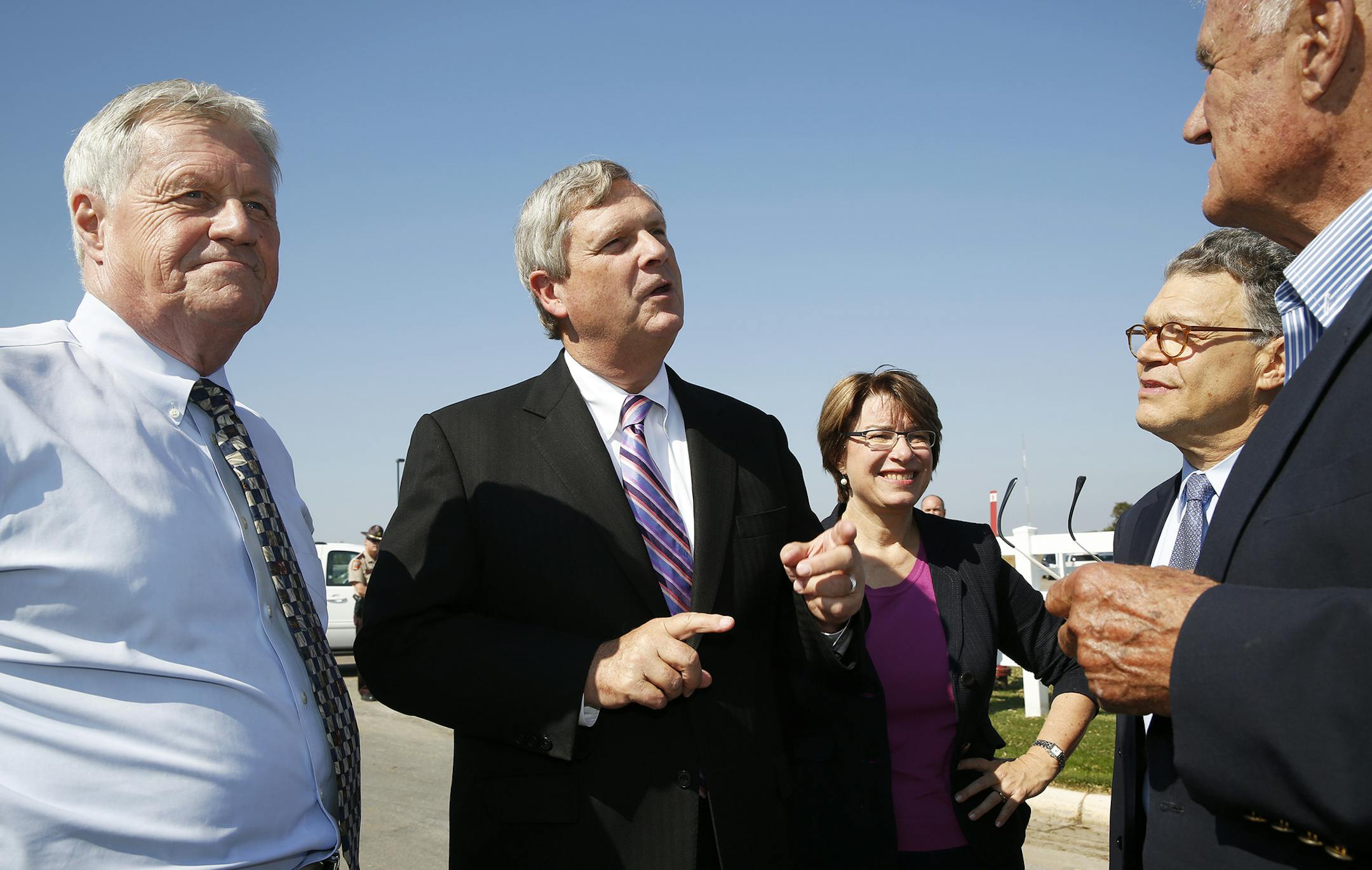 U.S. Department of Agriculture Secretary Tom Vilsack, second from left, talks with U.S. Rep. Collin Peterson, D-Minn. from left, Sen. Amy Klobuchar, Sen. Al Franken, and Minnesota Farm Service Agency chairman David Haugo before unveiling new programs to help farmers better manage risk during a press conference at the University of Minnesota St. Paul campus on Thursday, September 25, 2014. ] LEILA NAVIDI leila.navidi@startribune.com / BACKGROUND INFO: The new programs, Agricultural Risk Coverage