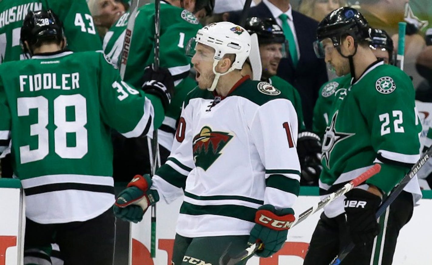 Minnesota Wild center Jordan Schroeder (10) celebrates his goal during the first period in Game 5 in the first round of the NHL Stanley Cup playoffs Friday, April 22, 2016, in Dallas.