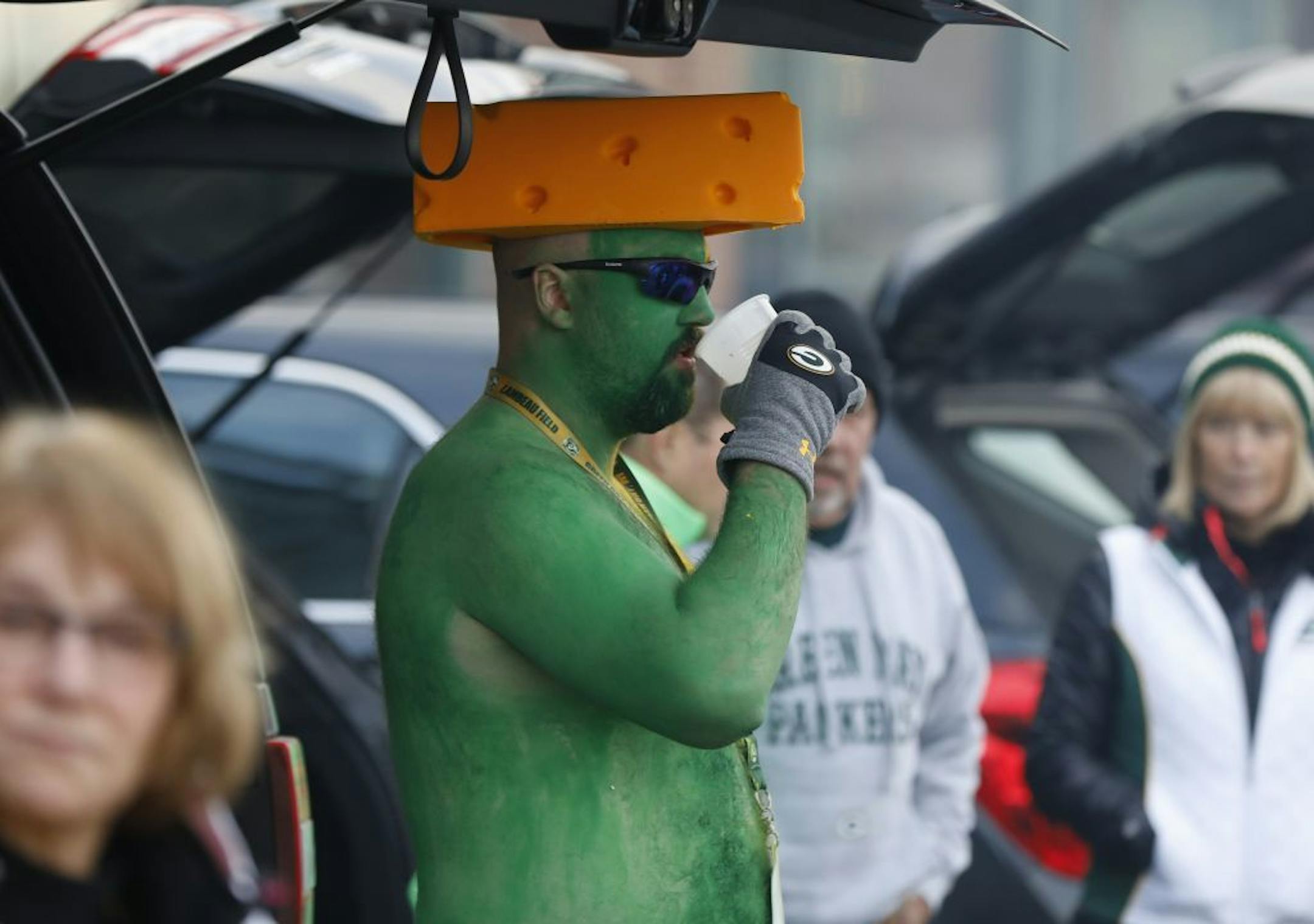 Fans tailgate before an NFL football game between the Green Bay Packers and the Detroit Lions Monday, Nov. 6, 2017, in Green Bay, Wis.