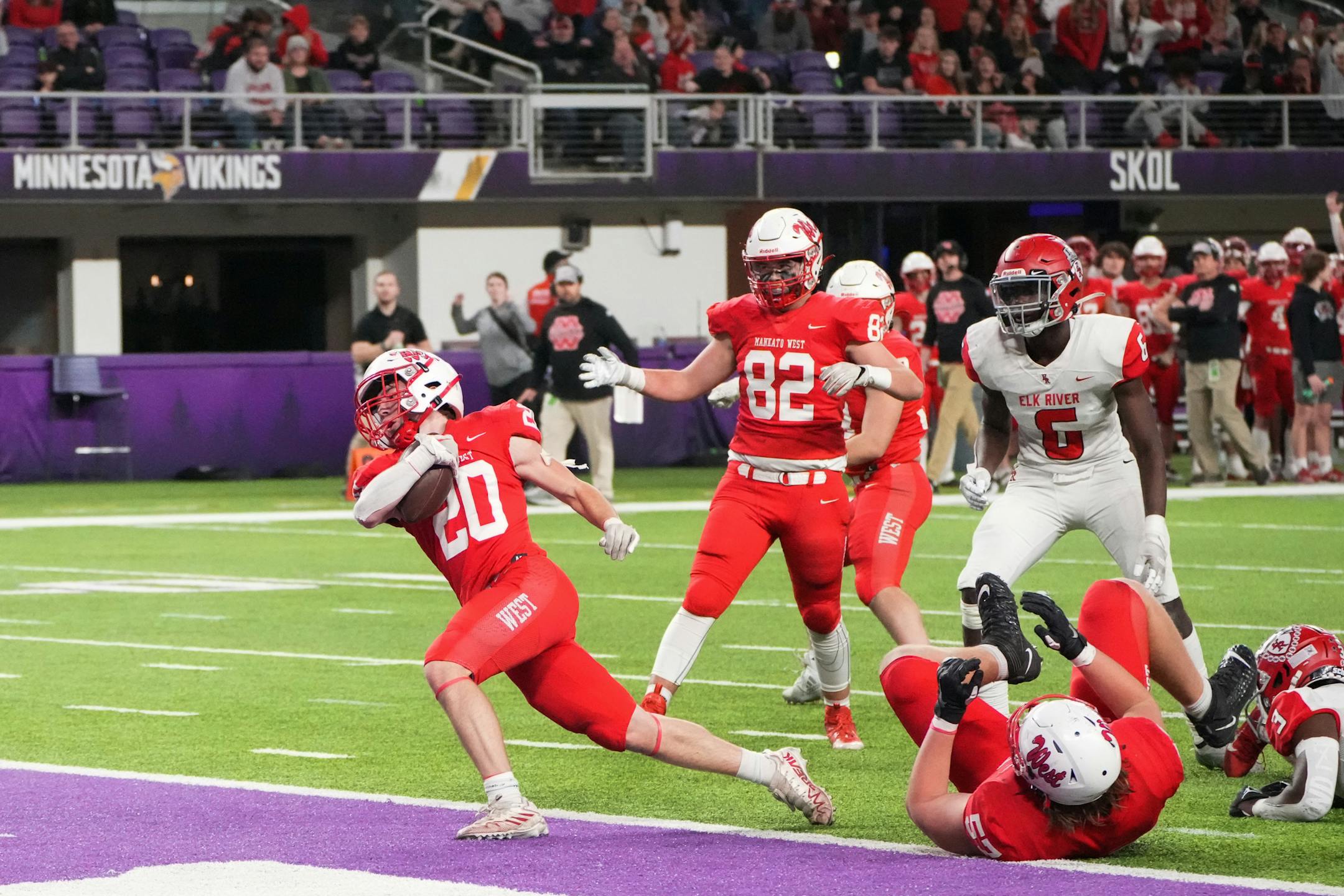 Mankato West's Jackson Froderman (20) runs into the endzone for a touchdown in the second half of the Minnesota High School football Class 5A State Championship at U.S. Bank Stadium in Minneapolis, Minn., on Saturday, Dec. 3, 2022.