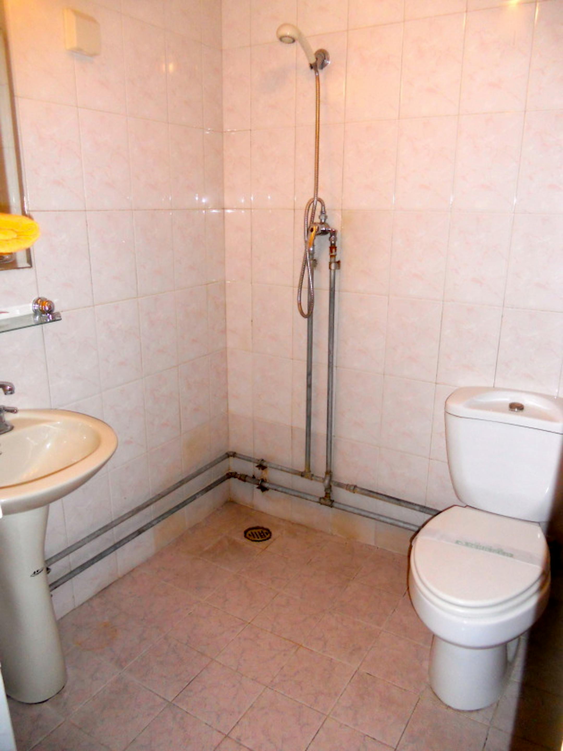 It's different than an American bathroom, but I'm just happy to have a Western toilet.