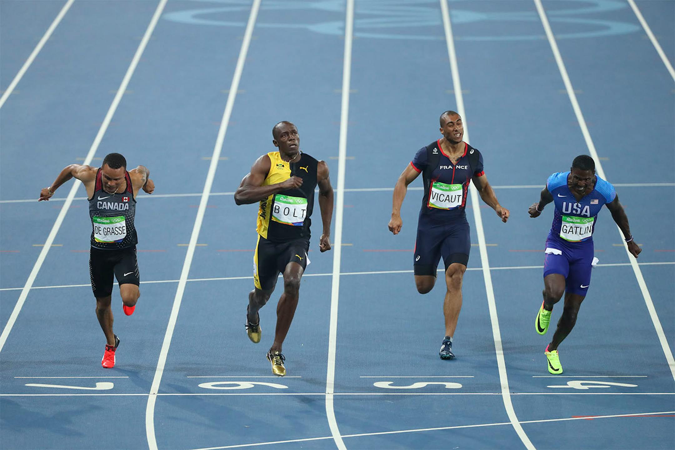 Usain Bolt of Jamaica, second from left, competes in the menís 100-meter final during the 2016 Summer Olympics at Olympic Stadium in Rio de Janeiro, Aug. 14, 2016. Bolt won the gold medal. From left: Andre De Grasse of Canada, Bolt, Jimmy Vicaut of France and Justin Gatlin of the U.S.