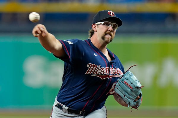 Twins pitcher Randy Dobnak delivers a pitch to the Tampa Bay Rays during the first inning