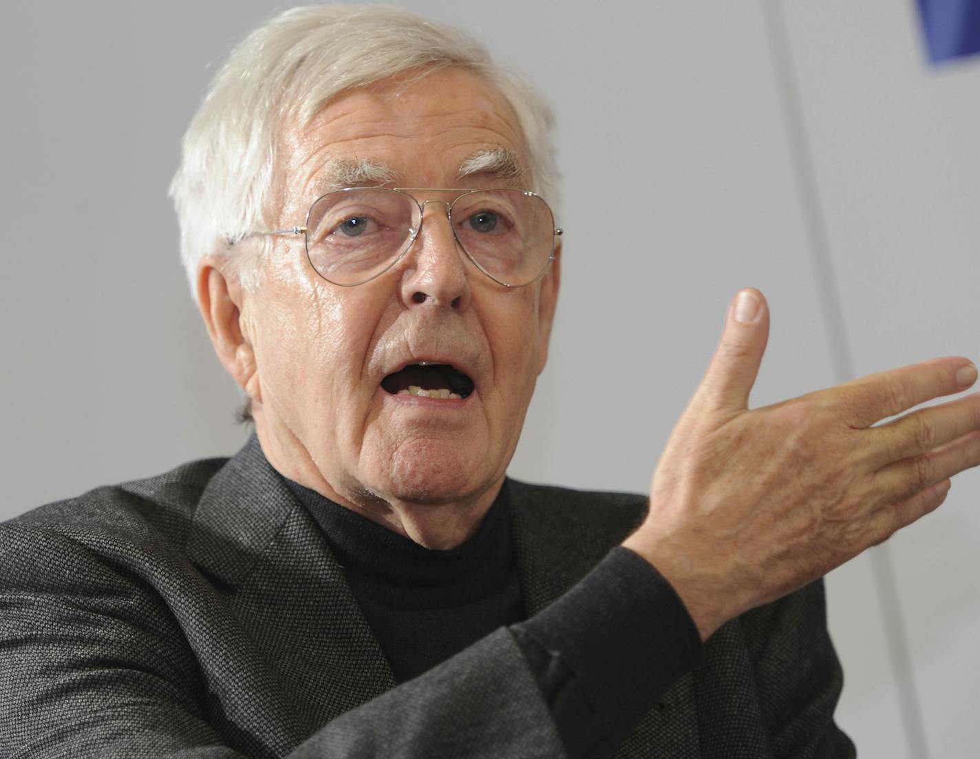 In this Sunday, Nov. 11, 2012 file photo Albert Speer jr. gestures during a press conference in Frankfurt, Germany. Albert Speer jr., the son of Adolf Hitler's chief architect who had his own accomplished architectural career, but struggled to distance himself from his father's legacy, has died. He was 83. (Arne Dedert/dpa via AP)