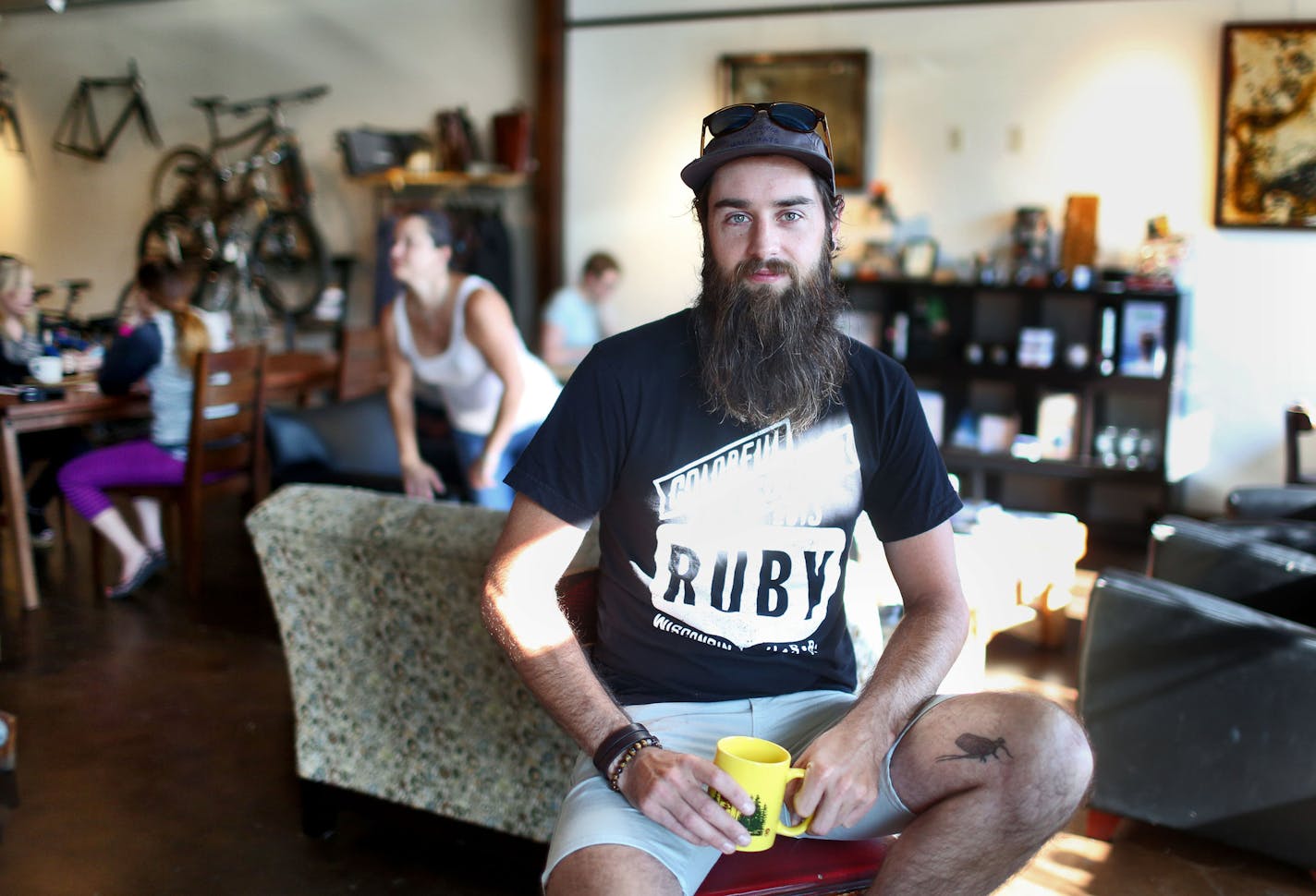 Joshua Klauck is the owner/proprietor of Angry Catfish Bicycle + Coffee Bar and was seen at his business Thursday, Aug. 18, 2016, in Minneapolis, MN.](DAVID JOLES/STARTRIBUNE)djoles@startribune Joshua Klauck is the owner/proprietor of Angry Catfish Bicycle + Coffee Bar and was seen at his business Thursday, Aug. 18, 2016, in Minneapolis, MN.**Joshua Klauck,cq