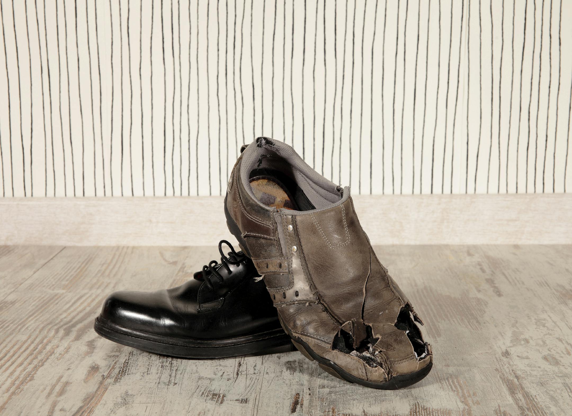 concept of rich and poor in a shoes