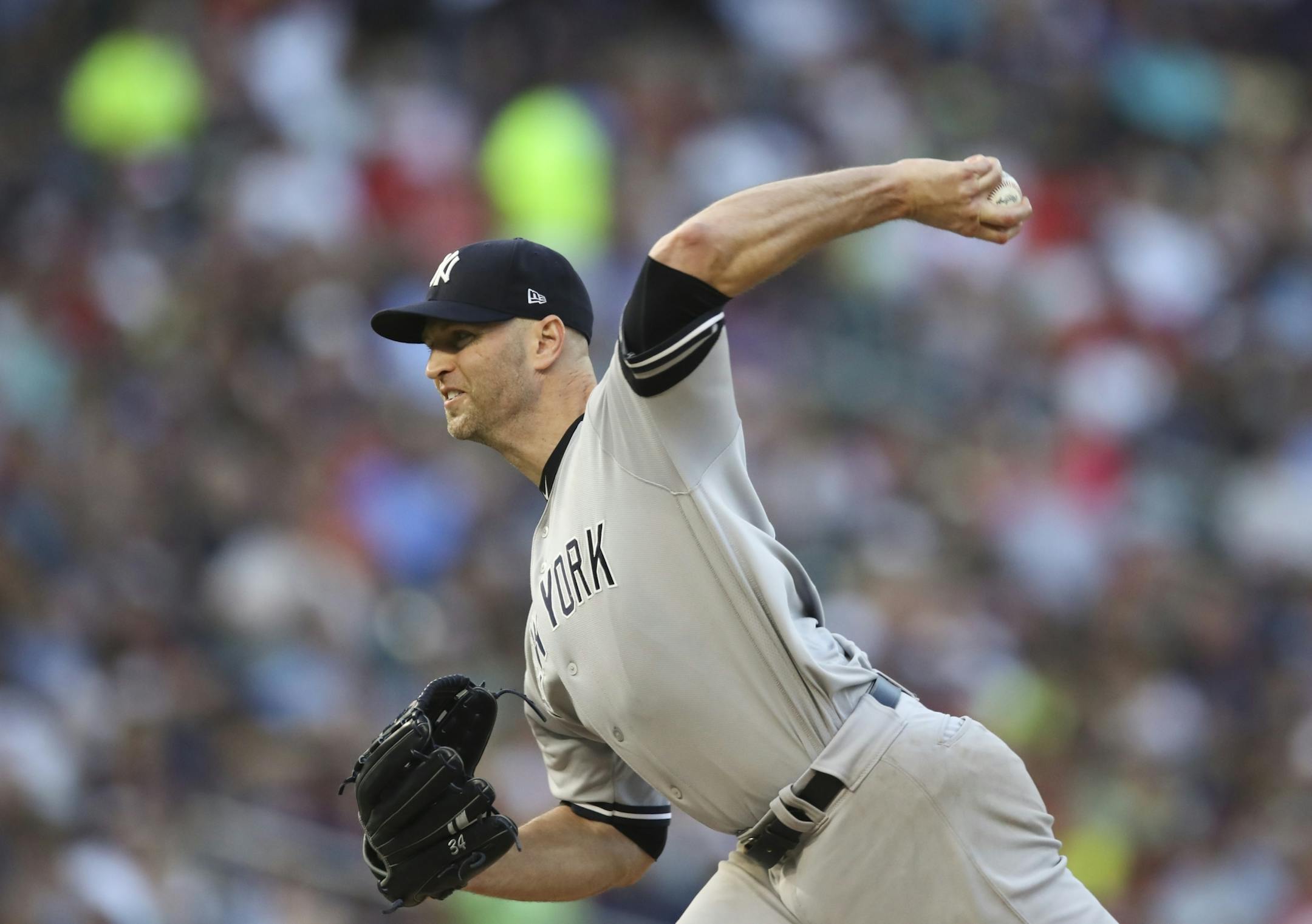New York Yankees starting pitcher J.A. Happ throwing against the Twins in the second inning.