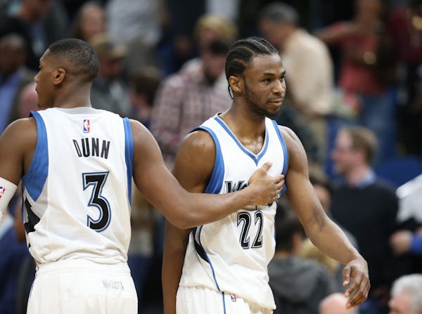 Minnesota Timberwolves guard Kris Dunn (3) consoled Andrew Wiggins (22) after he missed the last shot of the game giving OKC a 100-98 win at Target Ce