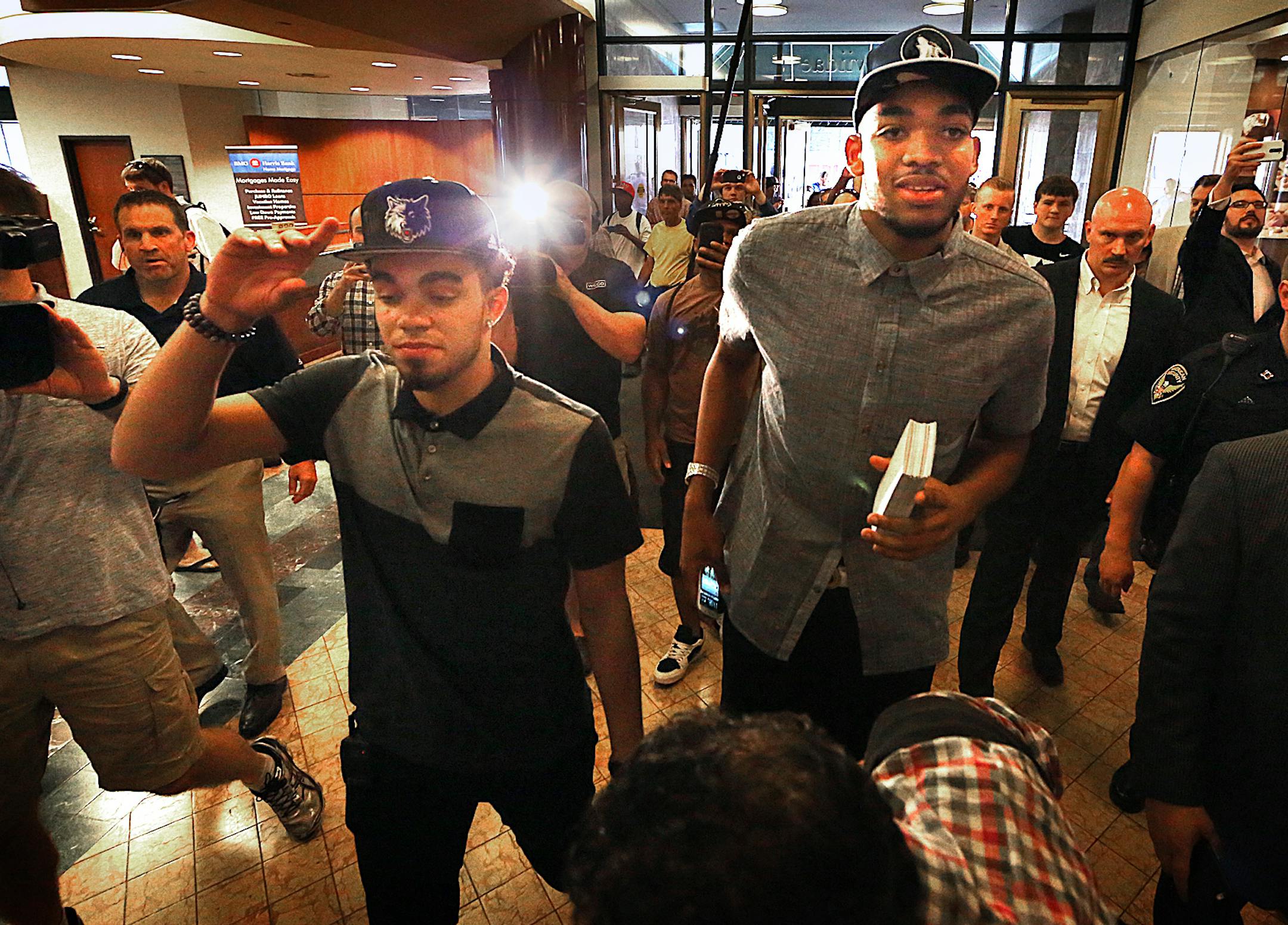 Timberwolves draftees Tyus Jones (left) and Karl-Anthony Towns spent part of their morning walking through the skyway before their news conference. ] JIM GEHRZ ï james.gehrz@startribune.com / Minneapolis, MN / June 26, 2015 / 11:00 AM ñ BACKGROUND INFORMATION: The Timberwolves will have a news conference to introduce draftees Karl-Anthony Towns and Tyus Jones at the Mayo Clinic Square atrium across from Target Center. Before the press conference, the two players will walk through the s