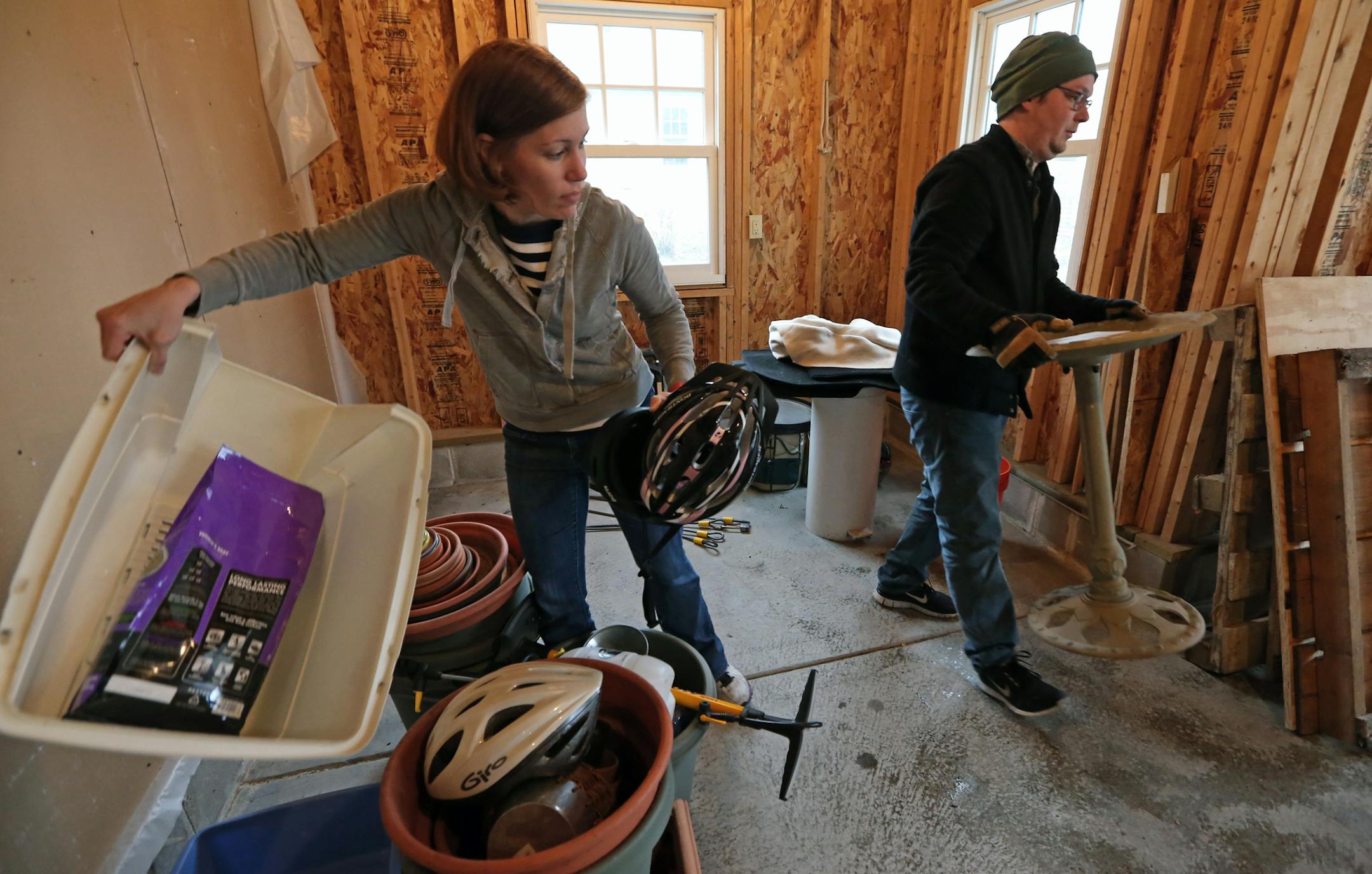 (left to right) Karen and Mark Swoverland packed up items in the garage, on 4/30/14, as they moved to an apartment after selling their house in south Minneapolis. The frustration continues for house buyers. During April, the supply of houses on the market fell to new lows, putting a lid on home sales and boosting prices. Karen and her husband sold their house in South Mpls in 2.5 days, but for months they've been looking for a house to replace it. They've had no luck, so they're moving into the