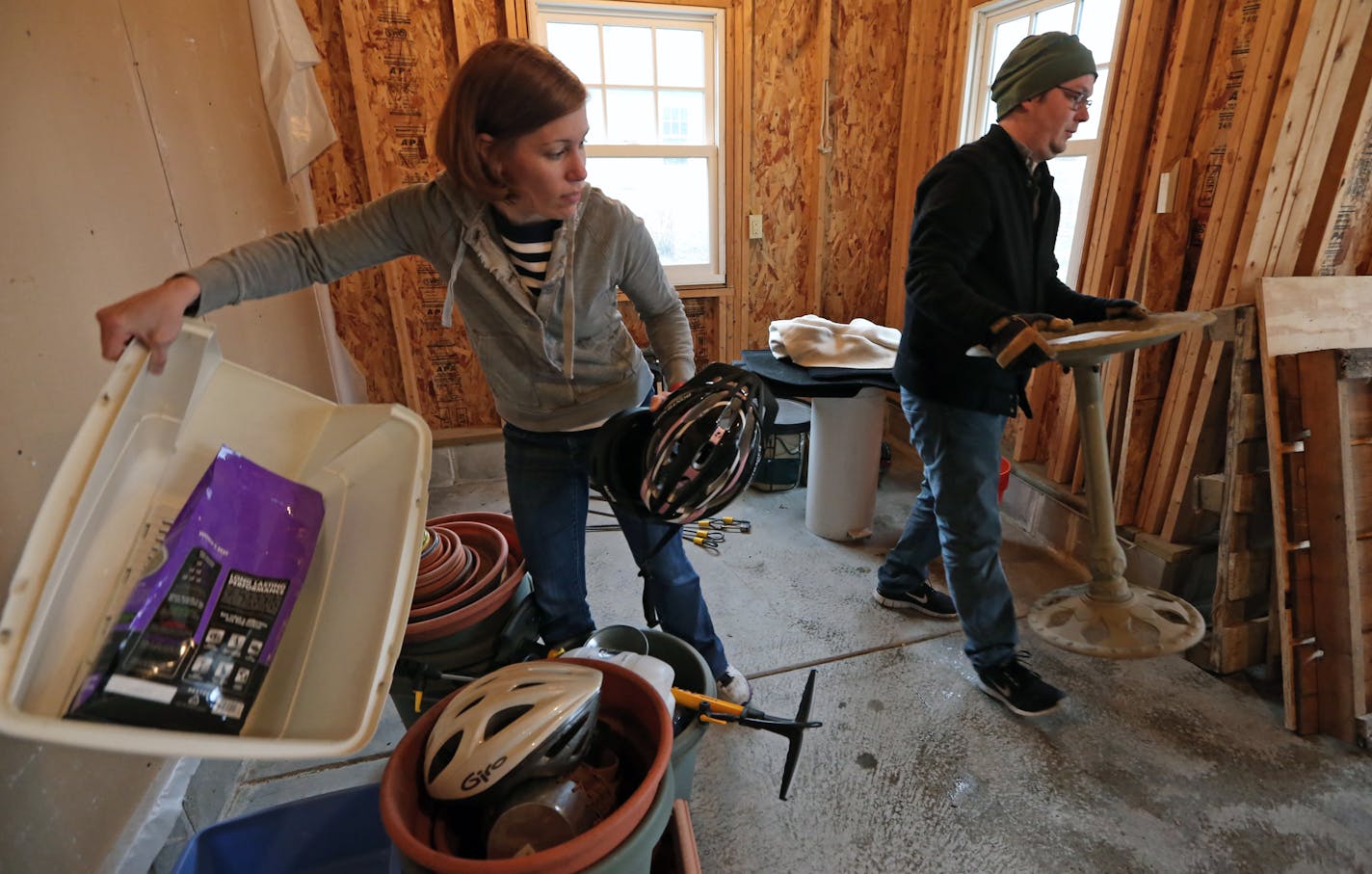 (left to right) Karen and Mark Swoverland packed up items in the garage, on 4/30/14, as they moved to an apartment after selling their house in south Minneapolis. The frustration continues for house buyers. During April, the supply of houses on the market fell to new lows, putting a lid on home sales and boosting prices. Karen and her husband sold their house in South Mpls in 2.5 days, but for months they've been looking for a house to replace it. They've had no luck, so they're moving into the