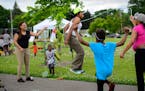Cynequa Hair and Sa'mya Coleman jumped rope at the Pop Up Park in Jordan Park in North Minneapolis. One of the free activities was to string together 