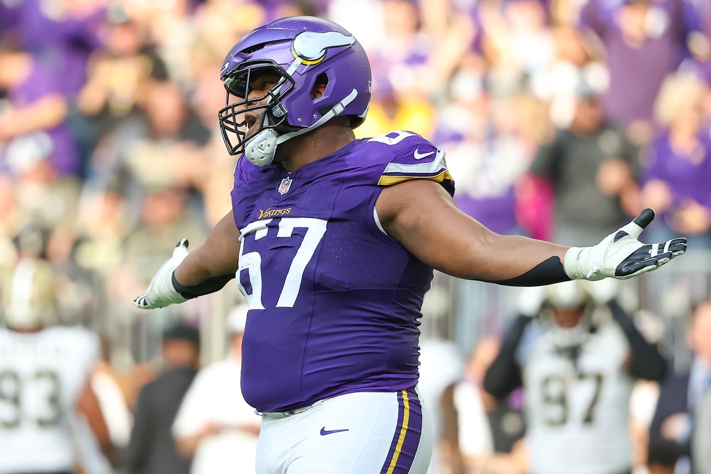 Minnesota Vikings guard Ed Ingram (67) celebrates after quarterback Joshua Dobbs (not pictured) runs for a touchdown against the New Orleans Saints during the second half of an NFL football game Sunday, Nov. 12, 2023, in St. Paul, Minn. (AP Photo/Matt Krohn)