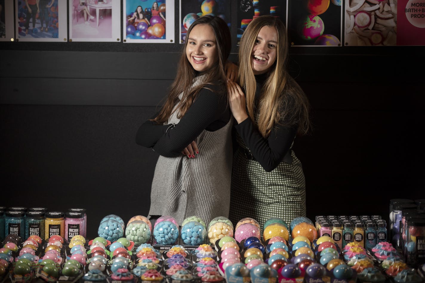 Isabel Bercaw, left, and sister Caroline continue to be the creative force behind their company, Da Bomb Bath Fizzers. (Jerry Holt/Star Tribune)