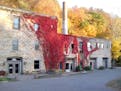 $1.35M historic brewery complex in Jordan boasts 6 apartments, 2 houses and a cave