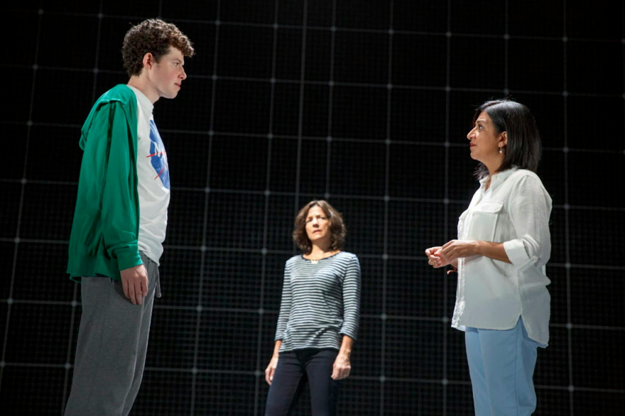 Adam Langdon as Christopher Boone, Felicity Jones Latta as Judy and Maria Elena Ramirez as Siobhan in the touring production of "The Curious Incident of the Dog in the Night-Time."