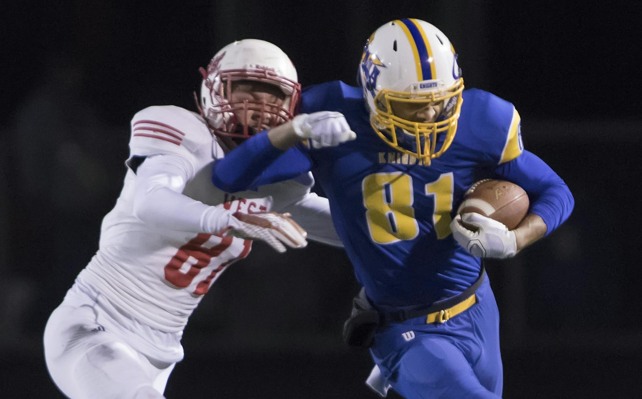 St. Michael-Albertville' Isaiah Weston (81) escapes the grasp of a Mankato West defender in the Class 5A semifinal Nov. 7 at Prior Lake High School.