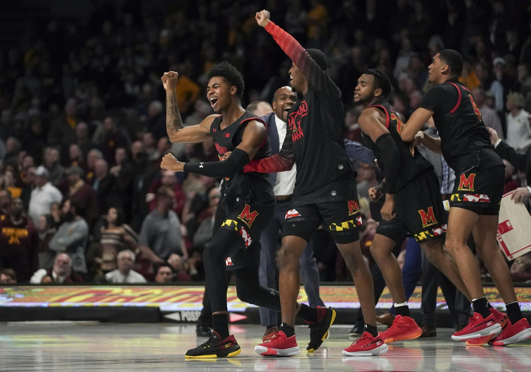 Maryland players celebrated a three-point shot that brought them a one point lead in the final seconds of the second half.