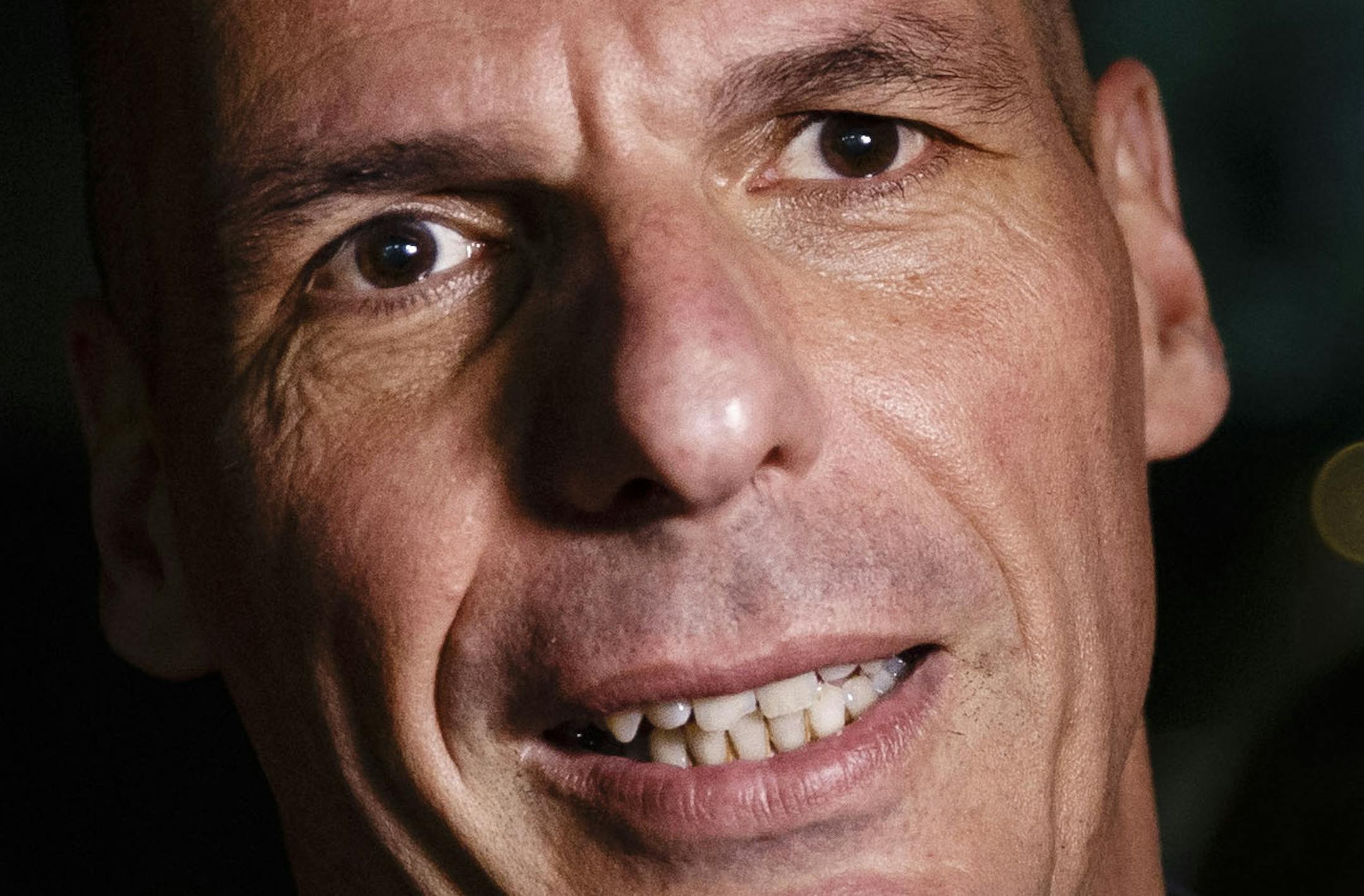 Greece's Finance Minister Yanis Varoufakis leaves his office in Athens, Wednesday, July 1, 2015. About 1,000 bank branches around the country were ordered by the government to reopen Wednesday to help desperate pensioners without ATM cards cash up to 120 euros ($134) from their retirement checks. Eurozone finance ministers were set to weigh Greece's latest proposal for aid Wednesday. (AP Photo/Daniel Ochoa de Olza)