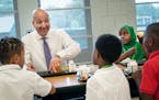 Superintendent Joe Gothard had lunch with kids at Obama Elementary in St. Paul on the first day of school.