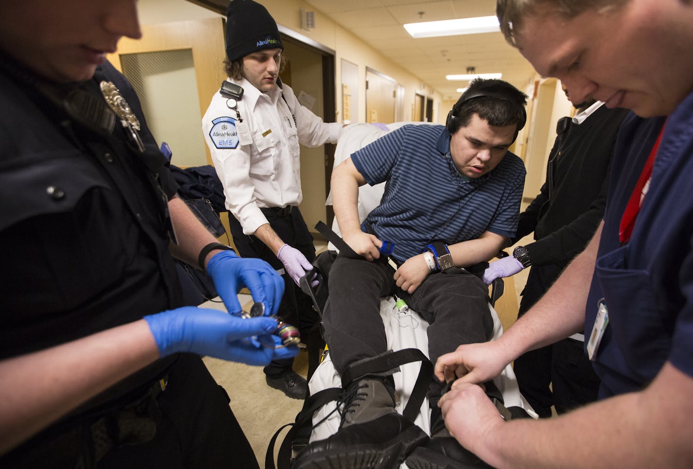 Matt Johnson required the attention of several Allina Health employees in preparation for his ambulance ride to his new group home from United Hospital in St. Paul. He stayed in United's emergency room for three weeks until a new residence could be found.