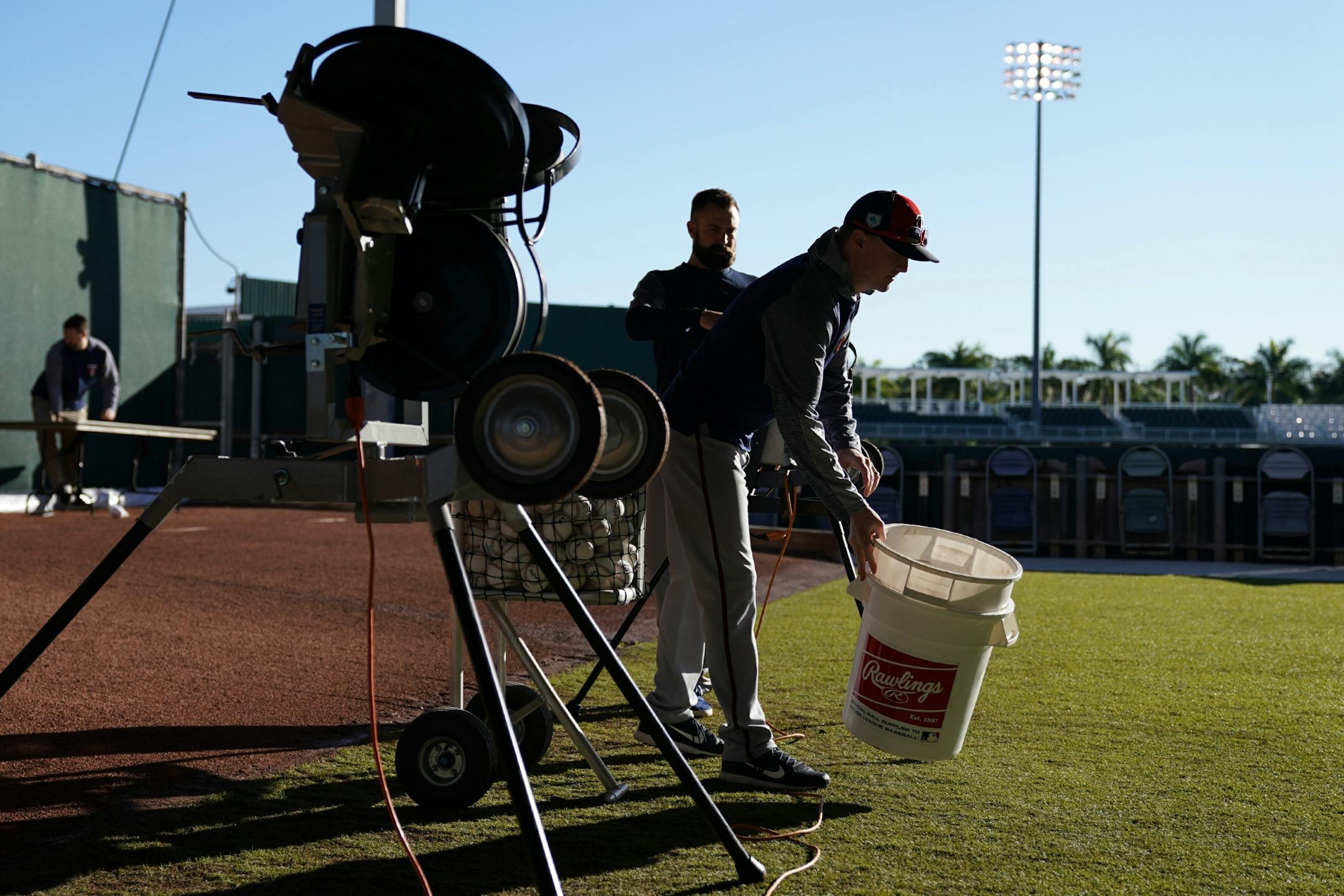 Twins coaches and staff readied the bullpens for the catchers to workout Thursday morning.